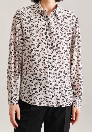 Long-sleeve button-up shirt in light pink fabric with black leaf pattern. Features a collar and button closure. Smooth, lightweight texture.