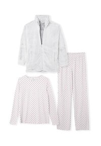 Miękka, biała kurtka na zamek, długi rękaw biały top w czerwone i niebieskie kropki oraz pasujące spodnie w kropki, miękki materiał, luźny krój.