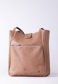 Brown leather tote bag with two straps, a front zip pocket, and embossed logo. Features a smooth texture and subtle stitching details.