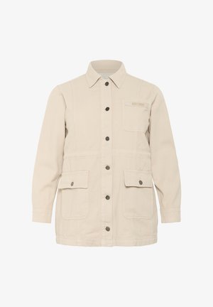 Beige kanvas jakk, millel on nööpide eest, kaks esist omane taskut ja üks rinna tasku. Omab särk kraed ja nähtavaid õmblus detaile.