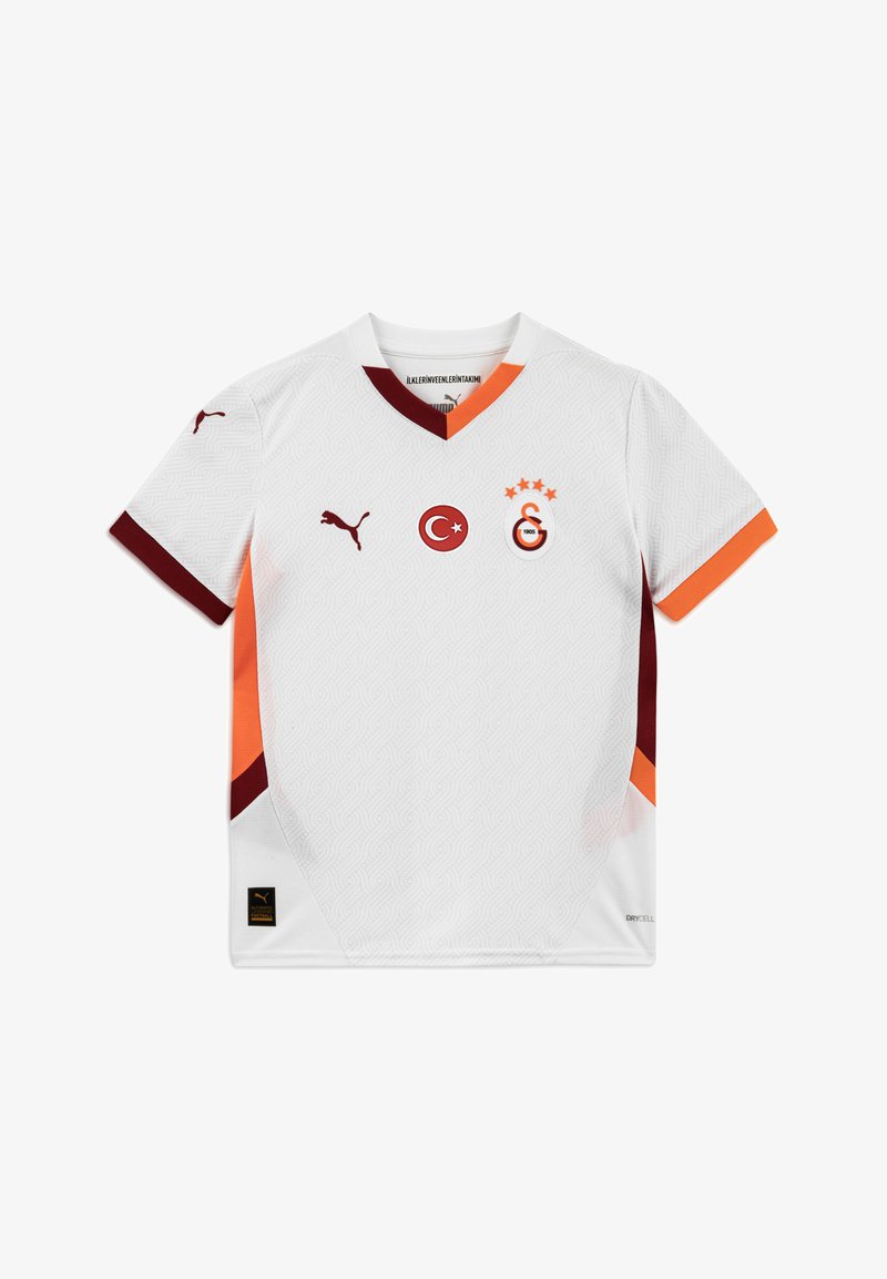 Maglietta da calcio bianca con scollo a V, caratterizzata da dettagli arancioni e bordeaux. Include il logo del club, la bandiera turca e un motivo testurizzato. Realizzata in materiale traspirante.