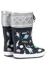 Navy rubber rain boots with a silver quilted top. Print features rockets, planets, and stars. White sole, with adjustable drawstring at the top.