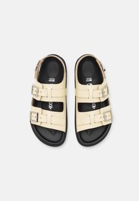 Birkenstock CANNES - Sandales - butter