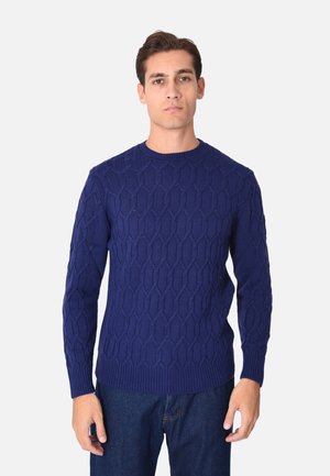 Maglione knit blu navy con un motivo a nido d'ape testurizzato, polsini e orlo a coste e un design classico a girocollo.