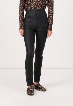 Leggings - Byxor - black
