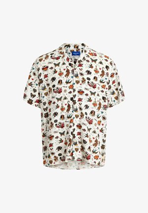 Fehér, rövid ujjú, gombos ing, színes tetoválás stílusú mintával, amely rózsákat, tigrist, fecskéket, szíveket, pillangókat és koponyákat tartalmaz.