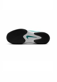 Suola di sneaker Nike con un motivo ondulato. Principalmente in gomma nera con accenti bianchi e teal. Presenta un dettaglio del logo centrale.