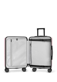 Valigia spinner con guscio rigido rosa, dettagli neri e interno in tessuto liscio. Dotata di più scomparti e quattro ruote per la mobilità.