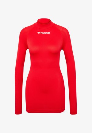 Rød langærmet træningstop med høj hals, lavet af strækbart materiale. Hummel-logoet trykt i hvidt på brystet. Glat tekstur.