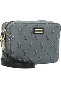 Svart och gråmönstrad axelväska med ett U.S. Polo Assn. emblem, dragkedjestängning och en avtagbar läderrem. Strukturerad tyg.