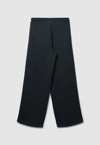 Pantaloni sportivi neri con un design a gamba larga, vita elastica e texture liscia. Nessun motivo visibile o dettagli in metallo.