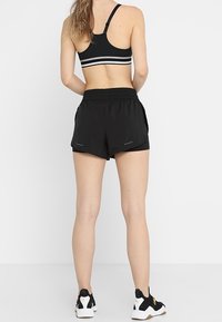 Puma Urheilushortsit - black