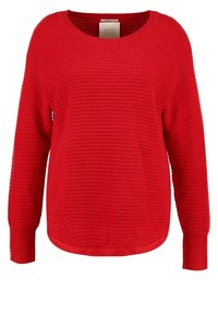 Rode gebreide trui met een gestructureerd patroon, lange mouwen en een ronde halslijn. Heeft een licht gebogen zoom en ribgebreide manchetten.
