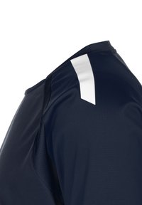 Navy sports jersey featuring a textured fabric, round neck, and a white diagonal stripe on the shoulder. Smooth finish, breathable design.