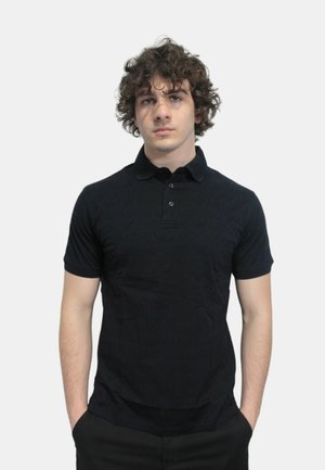 Short-sleeve black polo shirt with a textured pattern, featuring a collar and three-button placket. Tailored fit with a smooth fabric.