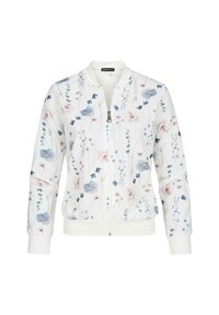Veste bomber florale blanche, ornée de motifs de fleurs bleues et roses. Poignets et taille côtelés, avec une fermeture éclair à l'avant.