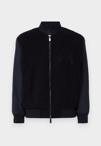 Giubbotto bomber nero con corpo in lana e maniche sintetiche blu navy, chiusura con zip, polsini a costine e logo AX ricamato sul petto.