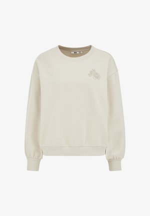 Sweat-shirt crème à col rond avec poignets et ourlet côtelés, ornée d'un petit motif floral brodé sur le côté gauche de la poitrine.