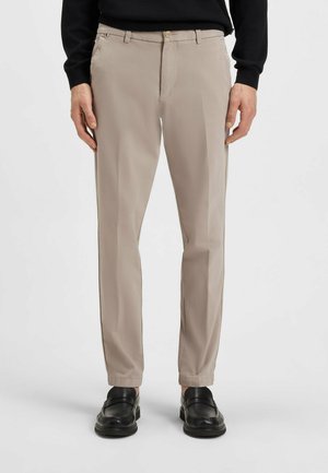 Light beige trousers with a straight fit, made of smooth fabric. Features side pockets, a button closure, and a clean, minimalist design.