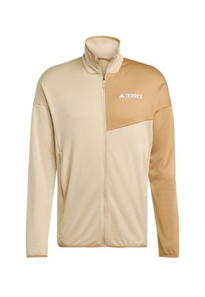 Beige jacket with a zip front and high collar, featuring a tan accent on the upper left side and a textured fabric design.