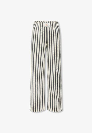 Pionowe czarno-białe paski na długich spodniach z elastycznym pasem i etykietą Lobster Club na środku z przodu.