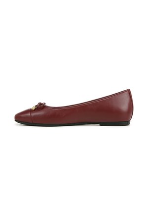 Burgundy leather flat shoe with a rounded toe, subtle bow detail, smooth texture, and a flat black sole.