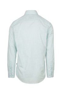 Lichtblauwe langemouwen shirt van textuurstof, met een rugpasdetail en knoopmanchetten. Afgeronde zoom en eenvoudig ontwerp zonder patronen.