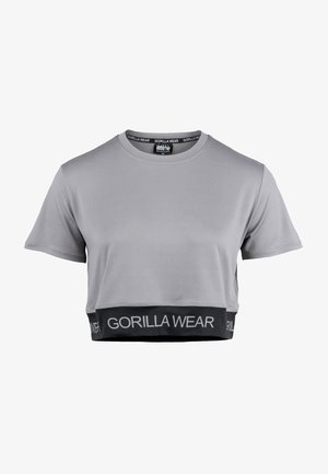 T-shirt gris court à manches courtes, col rond, avec une bande élastique noire à l'ourlet portant l'inscription "GORILLA WEAR" en blanc.