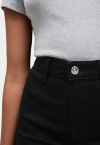 Marks & Spencer SEAMLESS WIDE LEG - Džíny Relaxed Fit - black