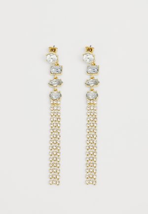 Zelta tonī austiņas ar caurspīdīgiem un pelēkiem rhinestoniem slāņainā dizainā, ar garu ķēdi, kas rotā mazi kristālu akcenti.