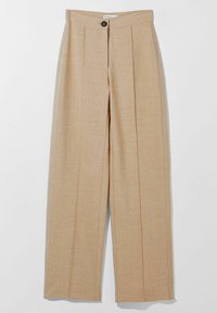 Beige weite Hosen aus strukturiertem Stoff, mit vorderen Falten und einem einzigen Knopfverschluss am Bund.