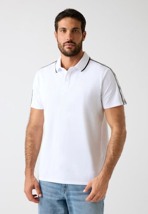 - Koszulka polo