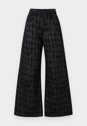Pantaloni neri a gamba larga con un motivo testurizzato, dotati di vita alta, tasche frontali e chiusura con bottone nascosta. Finitura in tessuto morbido.