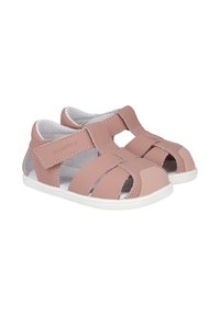 Sandalias de cuero rosa claro con diseño abierto, cierre de tira de velcro y suela de goma blanca. Presentan detalles de costura y aberturas transpirables.
