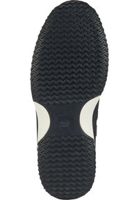 Suola di scarpa in gomma nera con un motivo a zigzag, caratterizzata da un accento bianco e il logo del marchio. Superficie testurizzata per aderenza e durata.