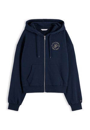 Granatowa bluza z kapturem zapinana na zamek, z troczkami, przednimi kieszeniami, ściągaczami na mankietach i u dołu oraz małym, okrągłym logo na lewej piersi.