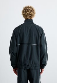 Converse RETRO CHUCK ELEVATED JACKET - Windbreakers - black