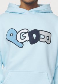 Pegador BANKS BOXY HOODIE - Mikina - washed baby blue