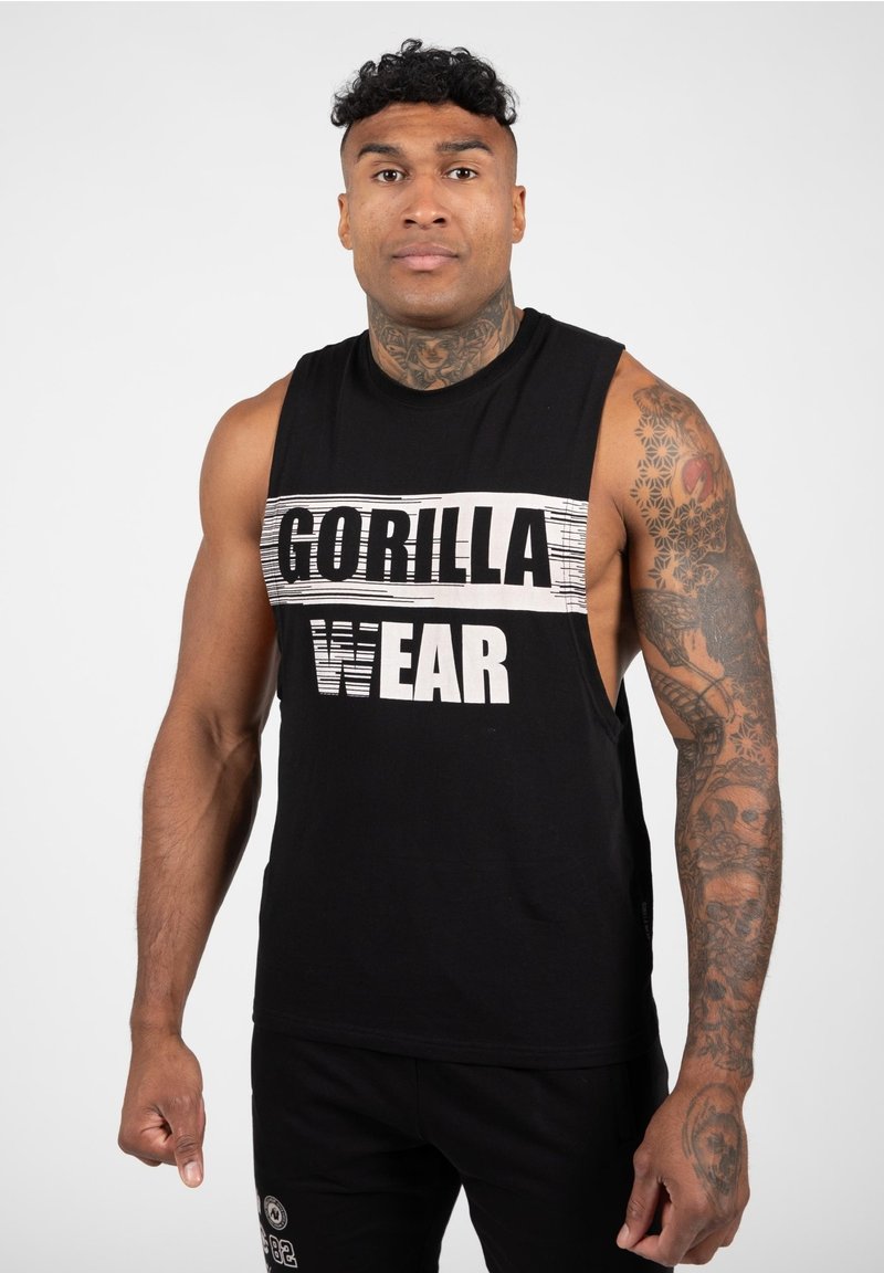 Zwarte mouwloze tanktop met "GORILLA WEAR" in grote witte letters gedrukt, met een comfortabele pasvorm en opvallende armsgaten.