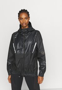 Adidas By Stella Mccartney Sportinė Striukė Black Juoda Zalando Lt