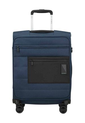 Blue soft-sided suitcase with black front pocket, two zippered compartments, four spinner wheels, and extended retractable handle.