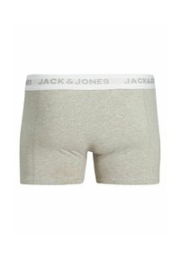 Herren Boxer Briefs aus leichtem grauem Baumwollmix mit einem weißen Bund, der den Text "JACK & JONES" in grau trägt. Glatte Textur.