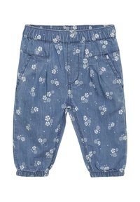 Pantalons en denim avec un tissu bleu ornés d'un imprimé floral blanc. Taille élastique, deux poches latérales et poignets froncés aux chevilles.