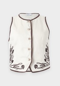 Αμάνικο εκρού γιλέκο με καφέ περιθώριο, κουμπιά μπροστά και σκούρα καφέ κεντήματα με λουλούδια κοντά στο κάτω μέρος και από τις δύο πλευρές.