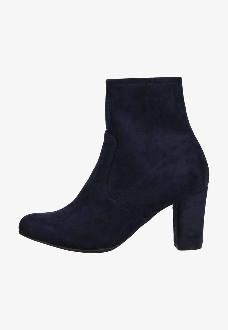 Bottines en faux daim bleu marine avec une silhouette élégante, un bout effilé et un talon épais haut. Caractéristiques de détails latéraux sans couture.