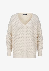 Suéter de punto marfil claro con escote en V, silueta oversized y patrón de calado que presenta rayas diagonales y puños acanalados.