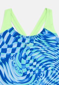 Μαγιό με κυκλικό σχέδιο σε μπλε και πράσινες αποχρώσεις με λουράκια σε νέον πράσινο χρώμα. Διαθέτει μαλακό ύφασμα και το λογότυπο “Speedo” στο κέντρο μπροστά.