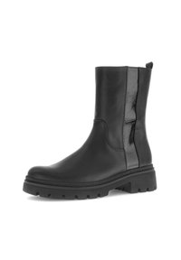 Černé kotníkové boty vyrobené z kůže s lesklou boční částí. Mají rugged podrážku a poutko pro snadné obouvání.