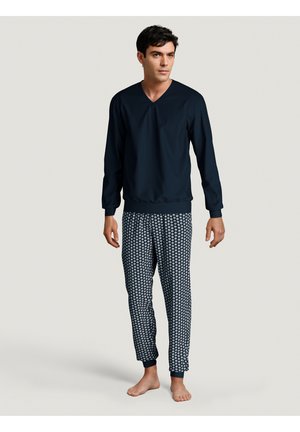 Marine V-hals langemouwtop gecombineerd met gestreepte pyjamabroek met een blauw-wit geometrisch ontwerp, elastische manchetten en tailleband.