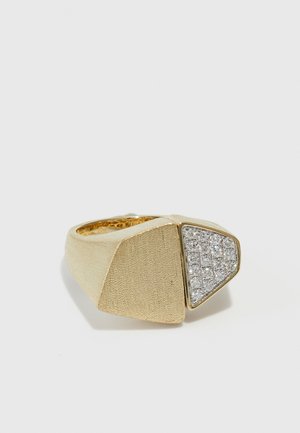 Gold ring featuring a geometric design with textured matte finish on one side and a cluster of sparkling clear crystals on the other.